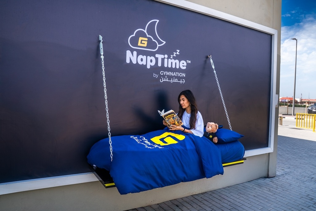 GymNation takes NapTime to the streets ?Sleeping Billboard ?