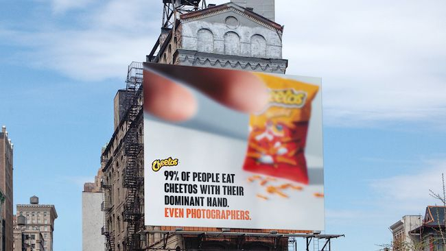 Cheetos shines the light on the ?other hand ? in their latest OOH campaigns1